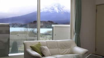 2LDK One-floor with Private Garden, Mt.Fuji & Lake View, 4 Semi-Double Bed and 1 Sofa Bed | Living area | Flat-screen TV, DVD player