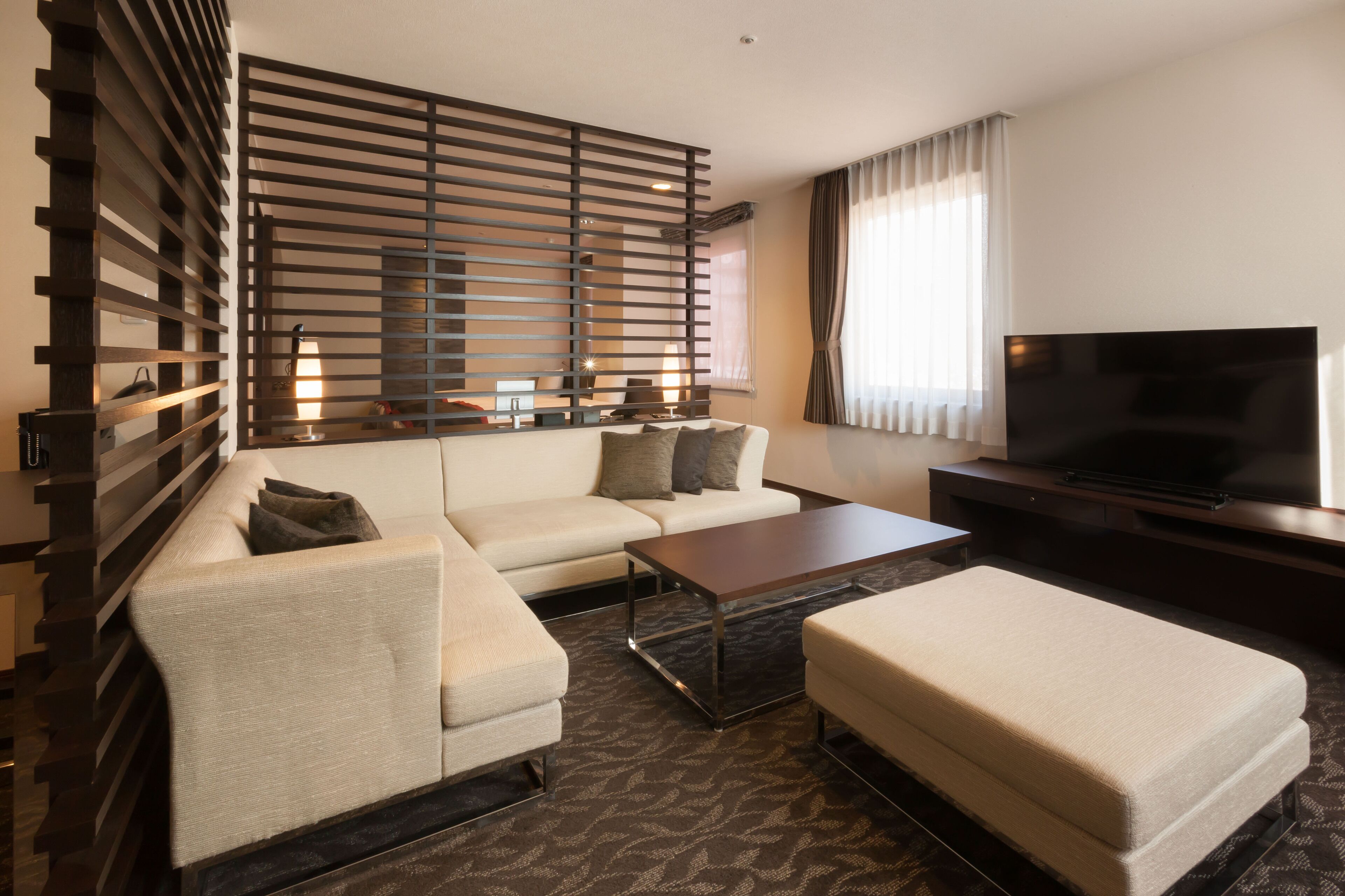 premium queen suite, non smoking | living room | 43-inch flat-screen tv with digital channels, tv