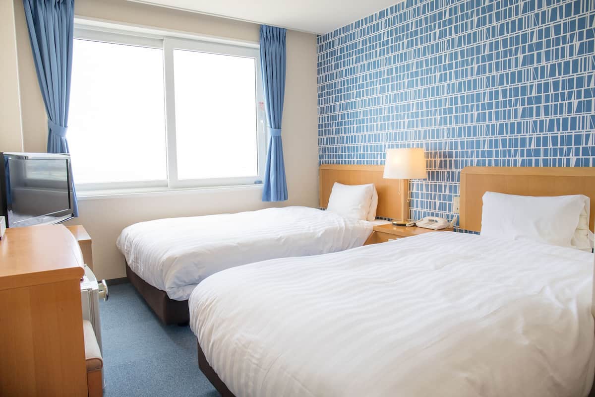 Desk, blackout curtains, free WiFi, bed sheets