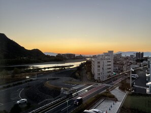 A cityscape with a river, a roundabout, and buildings. - Gifu Grand Hotel (Gifu)