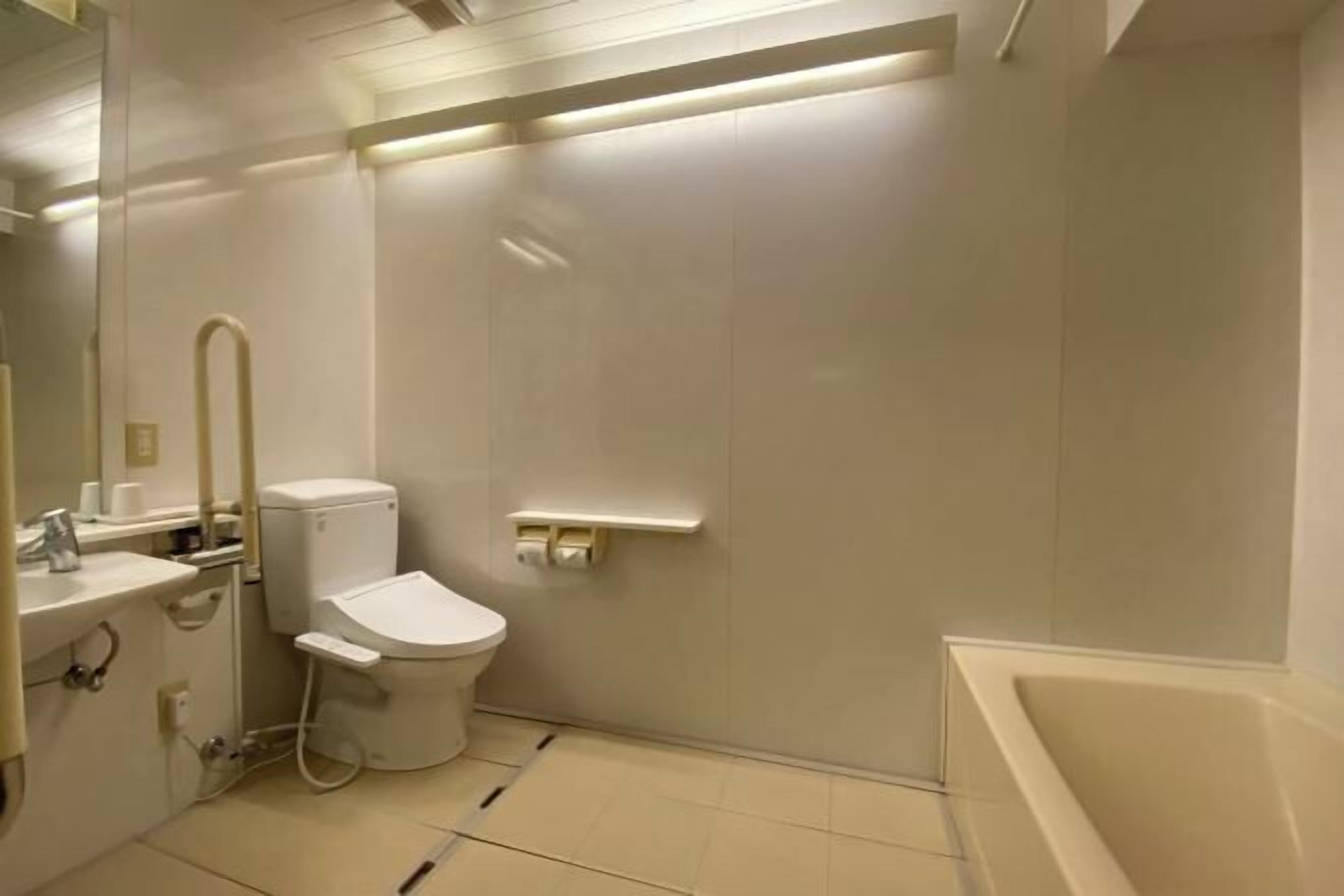 Bathroom | Combined shower/tub, hair dryer, slippers, electronic bidet
