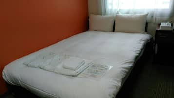 Desk, blackout curtains, free WiFi, bed sheets
