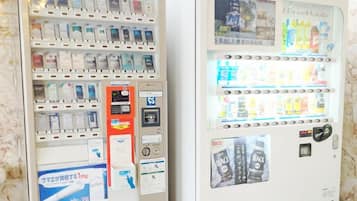 Two vending machines with various products.