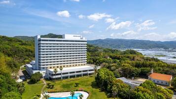 Seasonal outdoor pool, open 2:00 PM to 6:00 PM, pool umbrellas