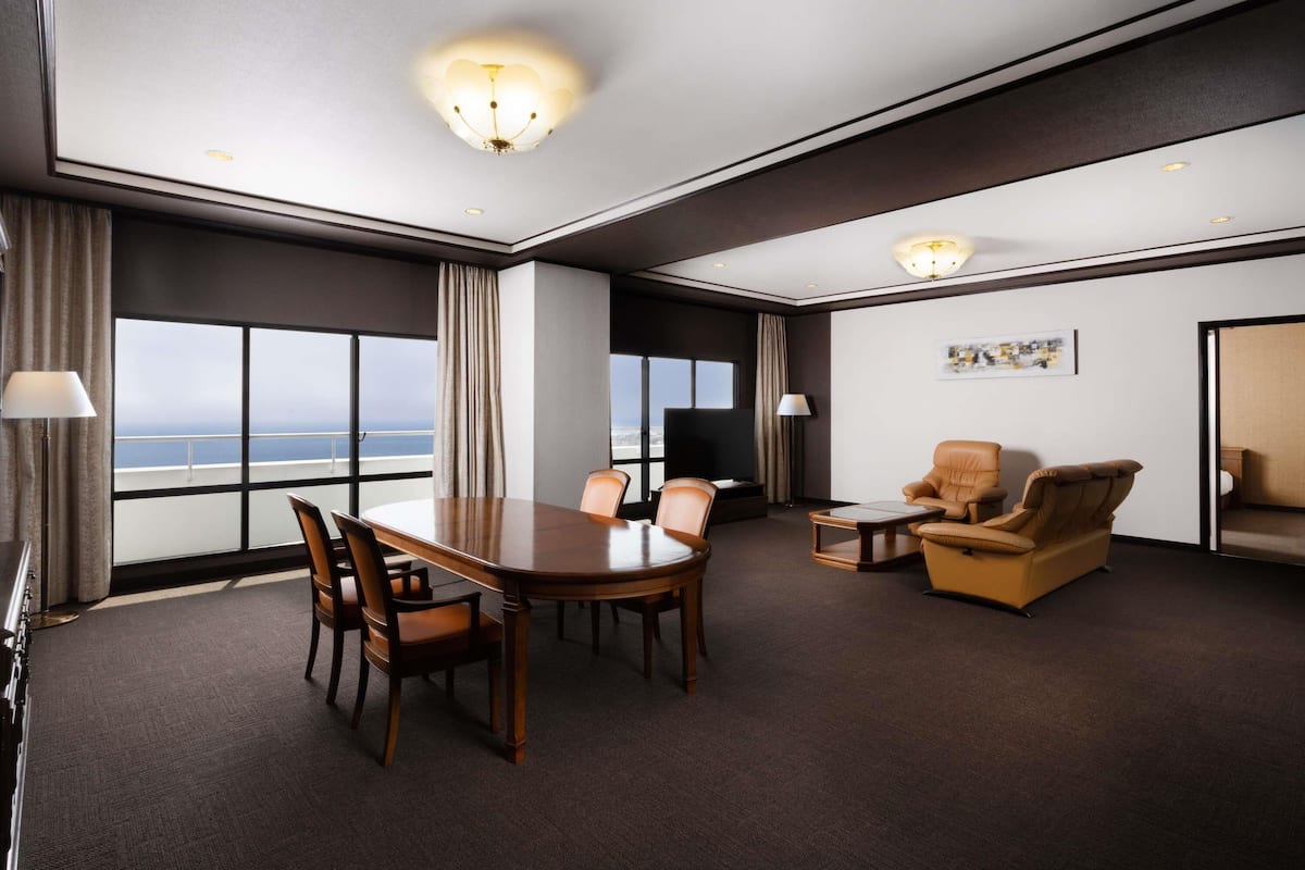 Deluxe Suite, Multiple Beds, Sea View | Premium bedding, down comforters, in-room safe, laptop workspace