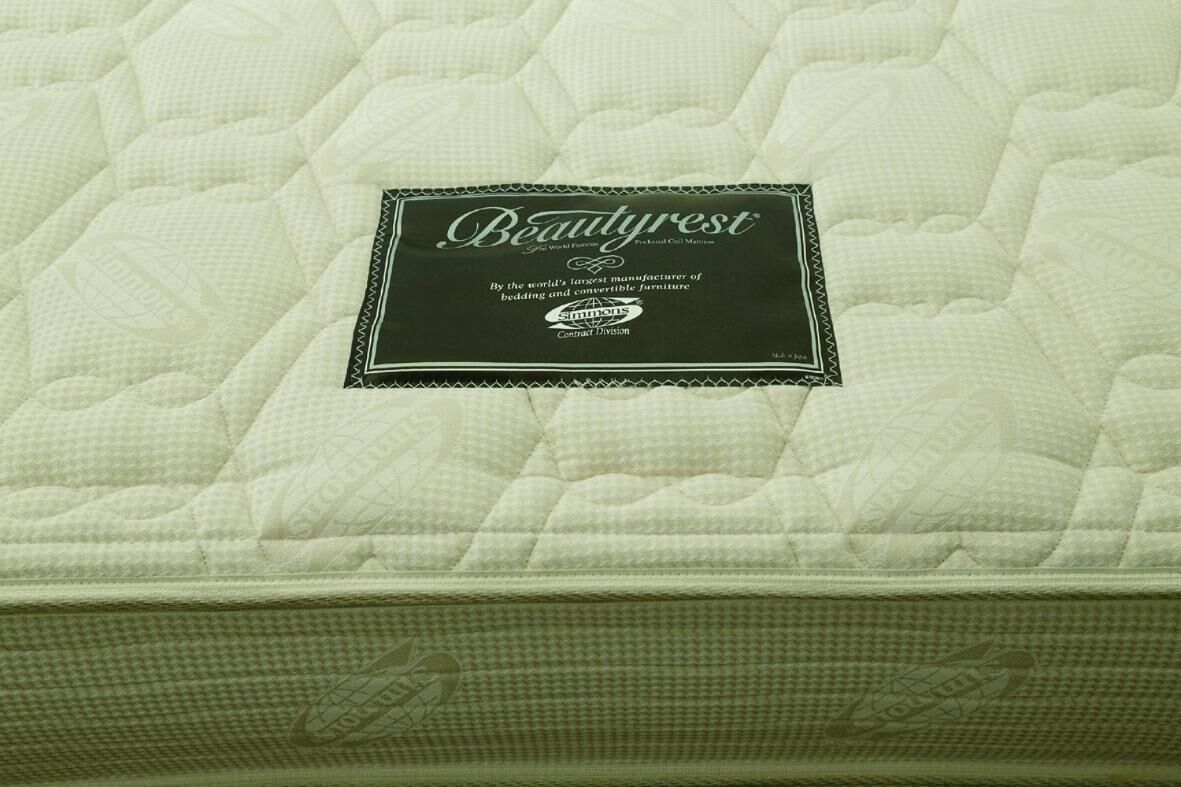 Un colchón con funda acolchada y una etiqueta que dice "Beautyrest".