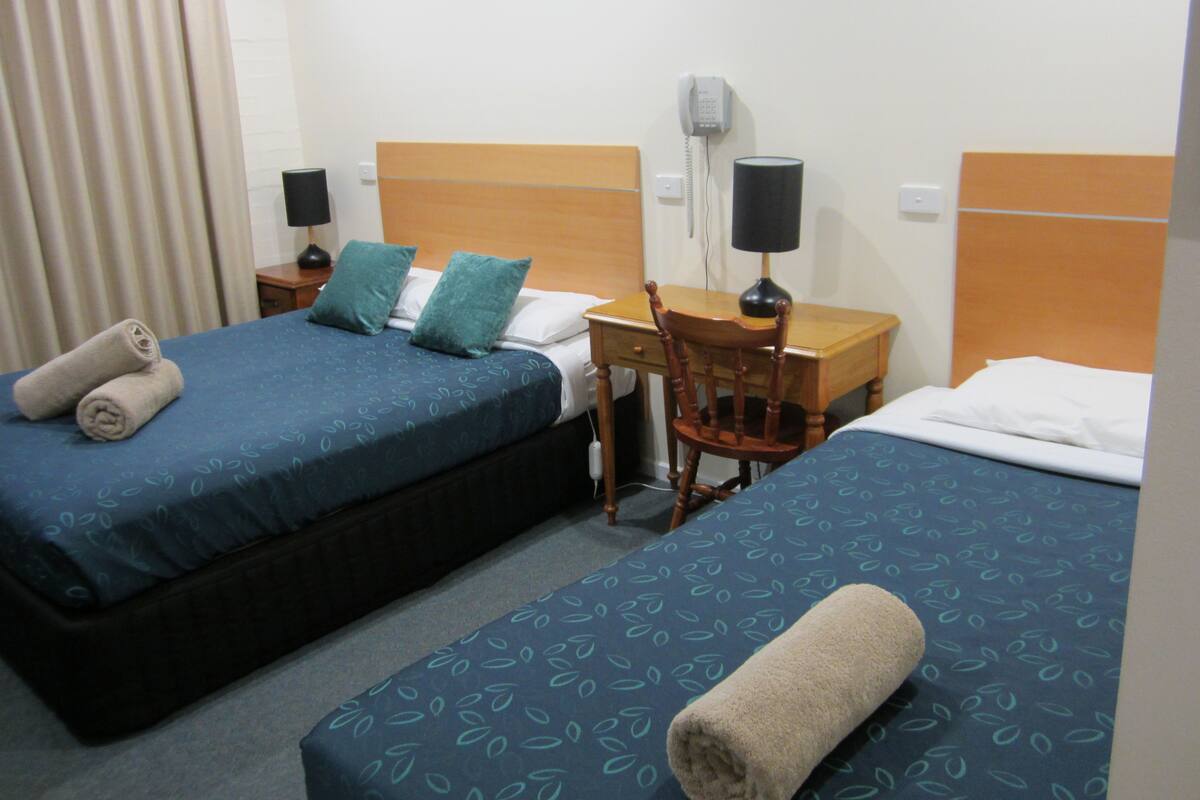 Habitación cuádruple, varias camas