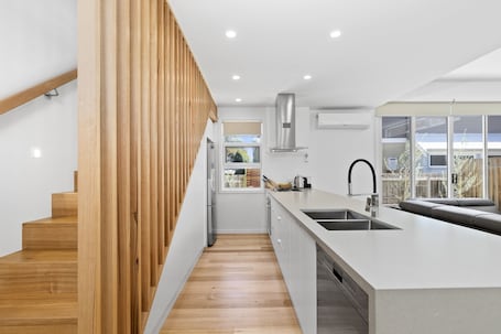 Luxury Three Bedroom Townhouse | Private kitchen | Fridge, microwave, electric kettle, highchair