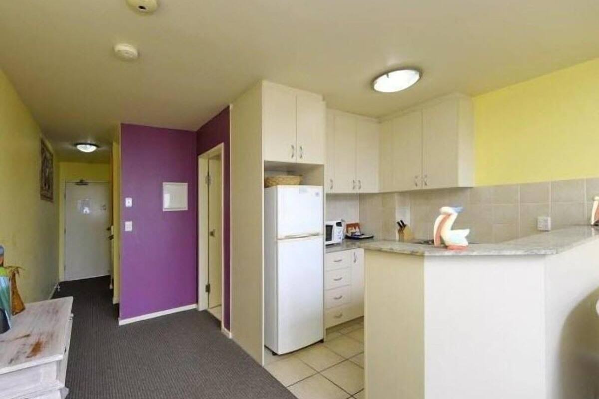 full-sized fridge, microwave, stovetop, dishwasher