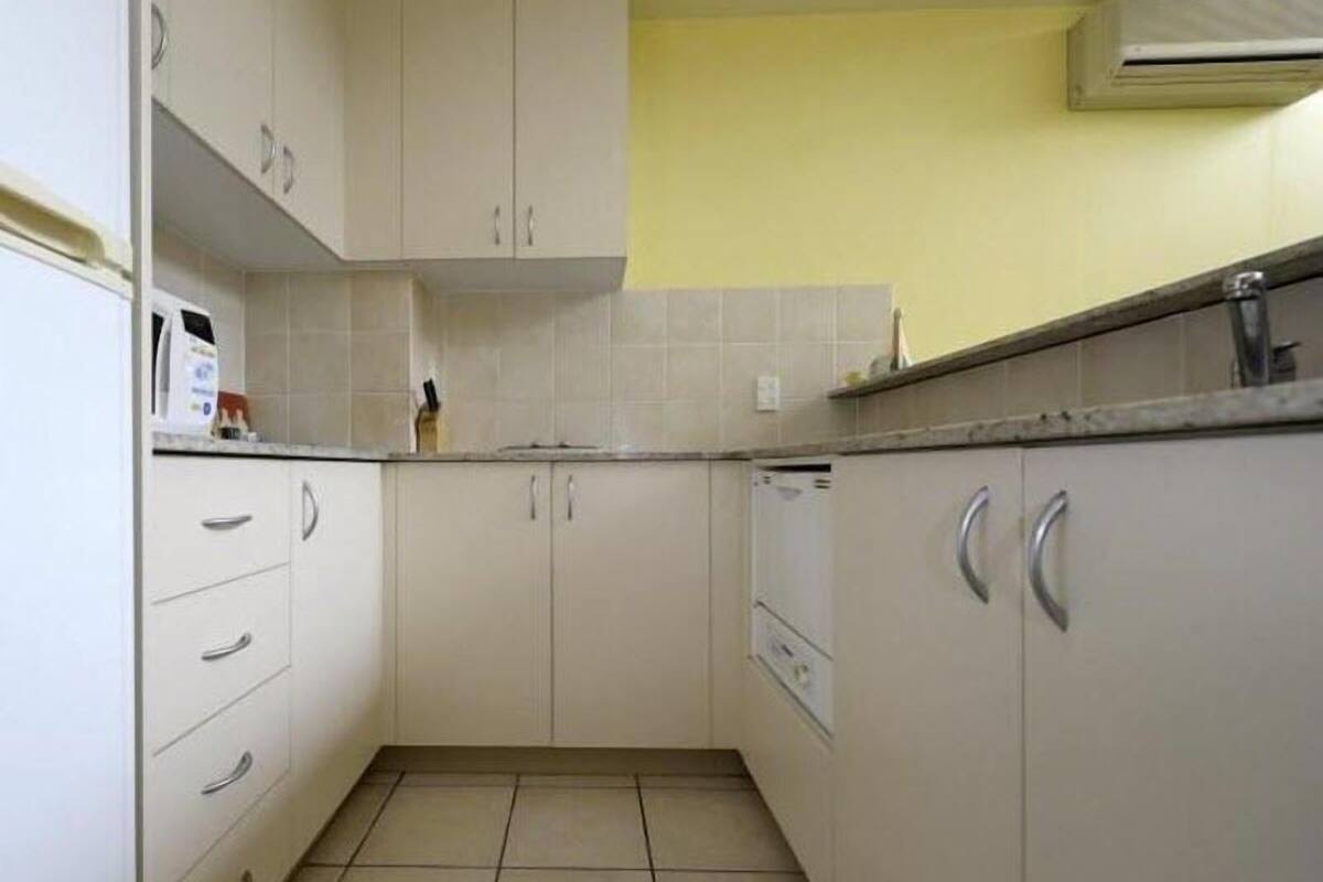 full-sized fridge, microwave, stovetop, dishwasher