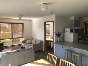 Standard Villas | Living area | 32-inch flat-screen TV with satellite channels, TV - Seahorse Coastal Villas (Peterborough)