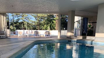 Indoor pool, outdoor pool, open 7:00 AM to 9:00 PM, pool loungers