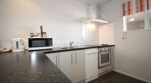 Fridge, coffee/tea maker, electric kettle, toaster