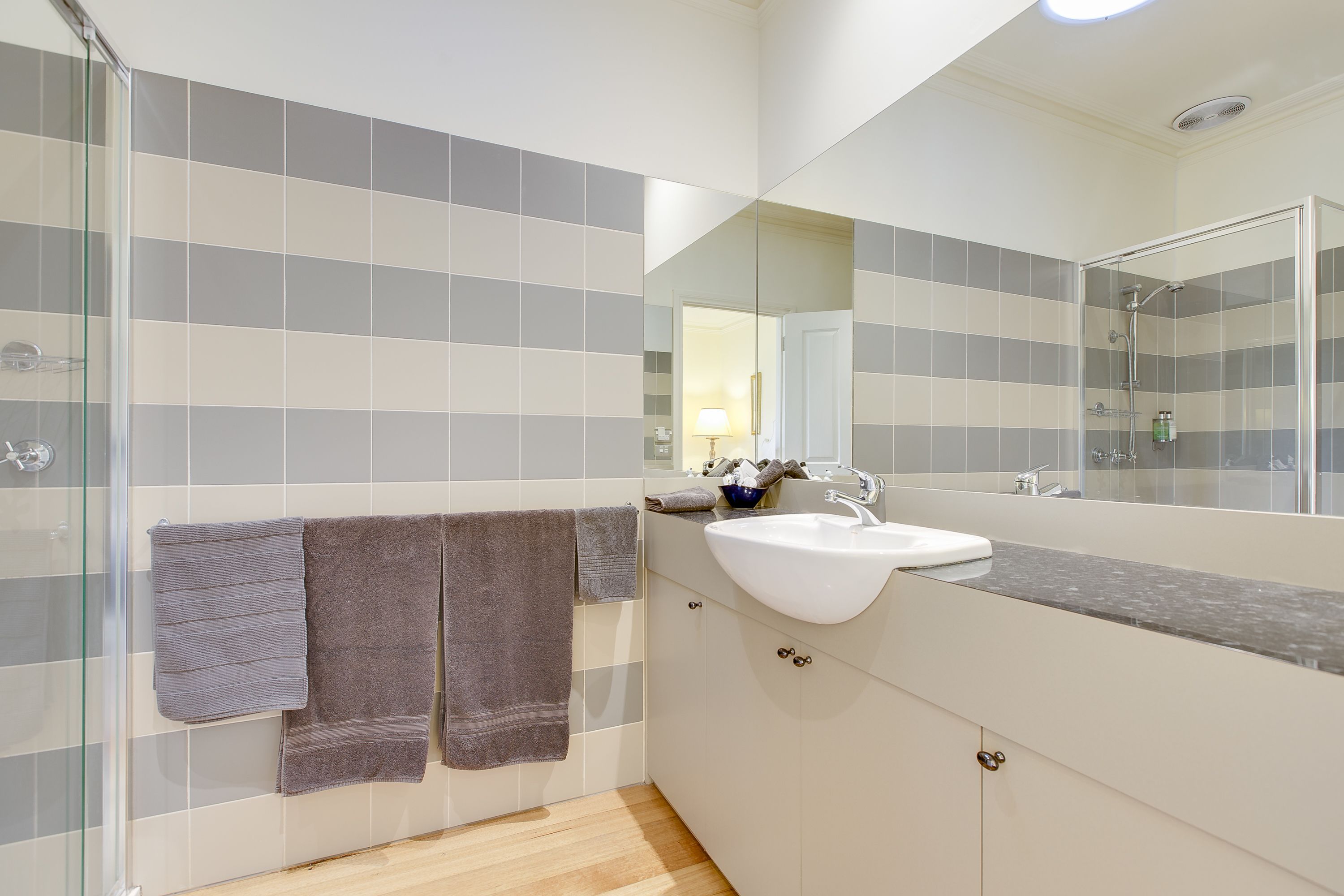 Designer toiletries, hair dryer, towels
