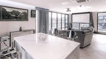 Penthouse Luxe, 1 trÚs grand lit | Coin séjour