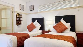 Executive-værelse | Premium-sengetøj, senge med topmadrasser, minibar, mørklægningsgardiner