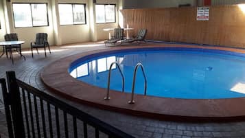 Indoor pool, open 8:30 AM to 7:30 PM, pool loungers