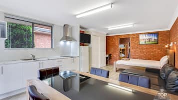 Deluxe Suite, 2 Bedrooms, Non Smoking, Kitchenette (Deluxe Villa 1 queen and 5 bunks ) | Iron/ironing board, free WiFi, bed sheets