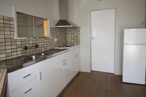 Standard Suite, 2 Bedrooms, Non Smoking, Kitchen (Self Contained Unit) | Private kitchen | Fridge, microwave, coffee/tea maker, electric kettle