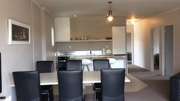 Fridge, microwave, cookware/dishes/utensils