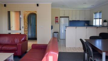 Apartment, 2 Bedrooms | Living area | TV