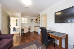 One-Bedroom Suite  | Living area | TV