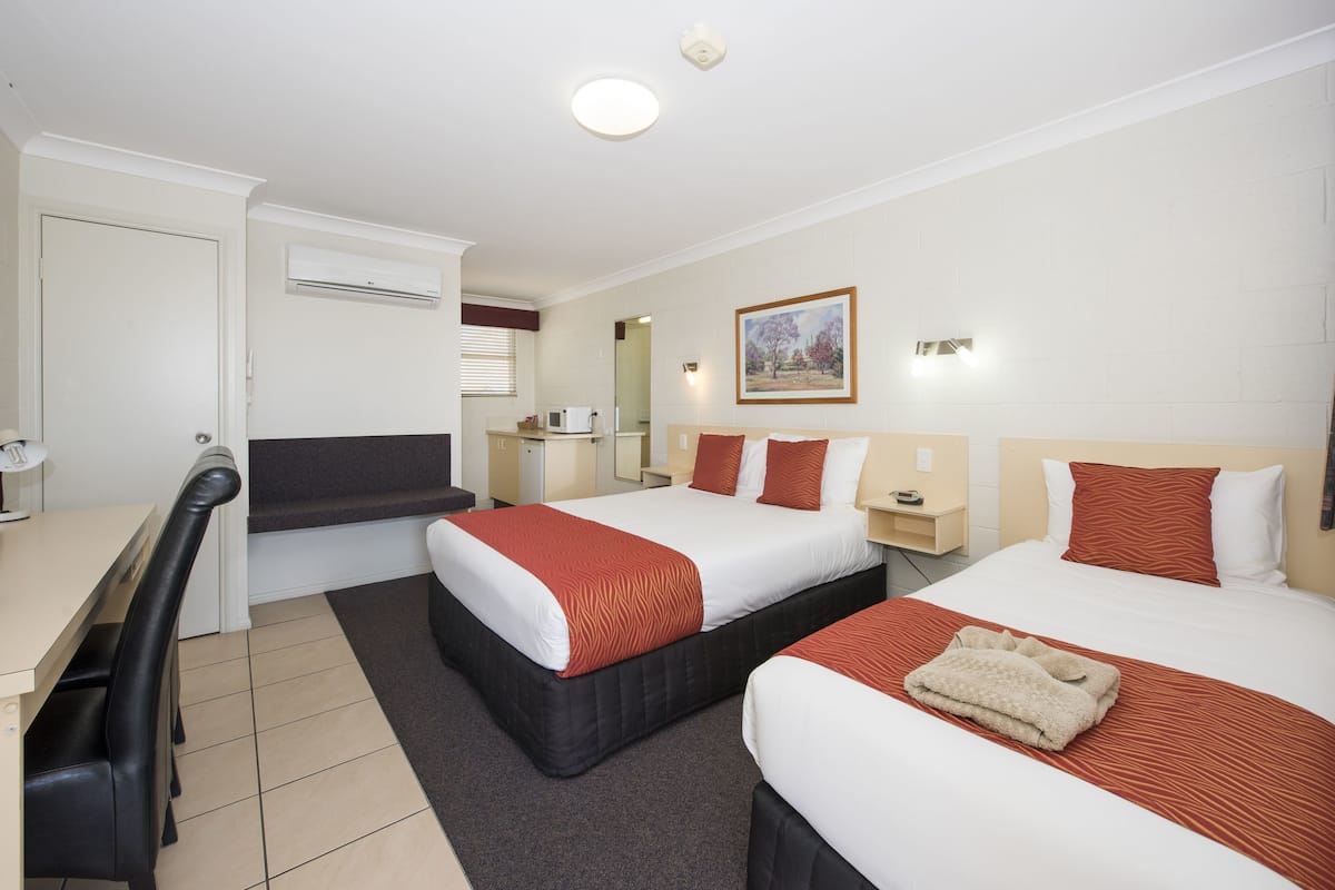 Queen and Single Room | Iron/ironing board, WiFi (free), bed sheets