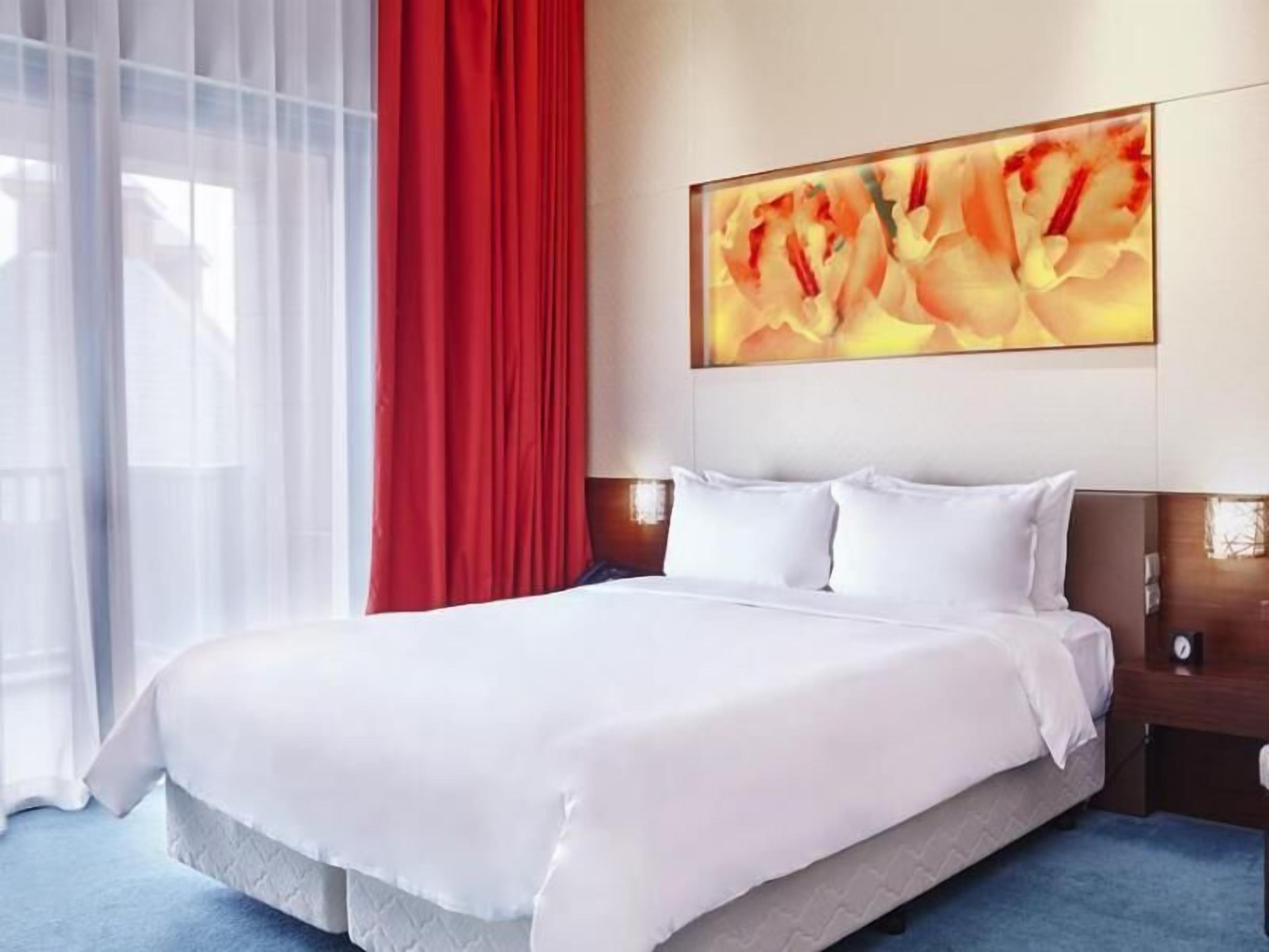Free minibar, in-room safe, desk, iron/ironing board