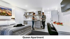 Queen Apartment | 1 bedroom, pillow-top beds, individually decorated, laptop workspace