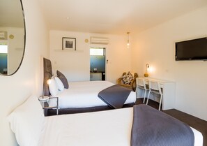 In-room safe, laptop workspace, blackout curtains, iron/ironing board