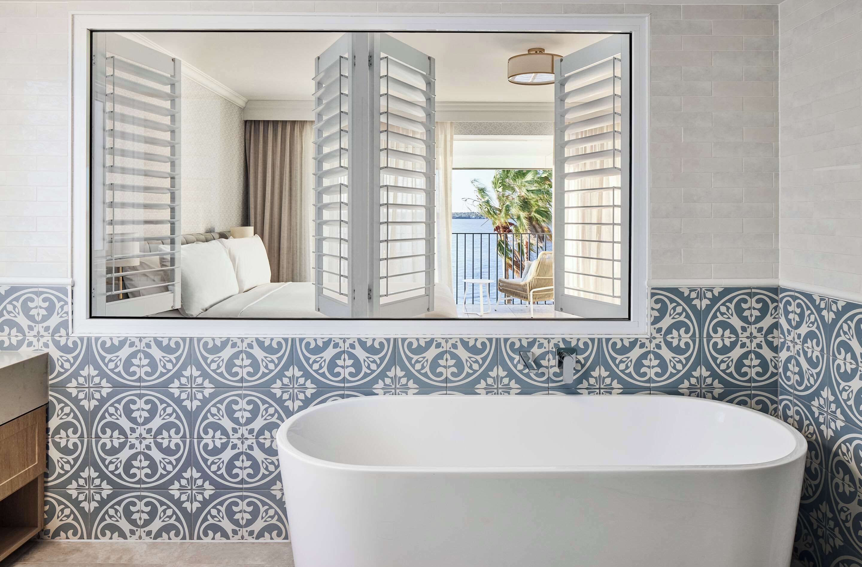 deluxe room, 1 king bed (water view) | in-room safe, individually furnished, desk, laptop workspace