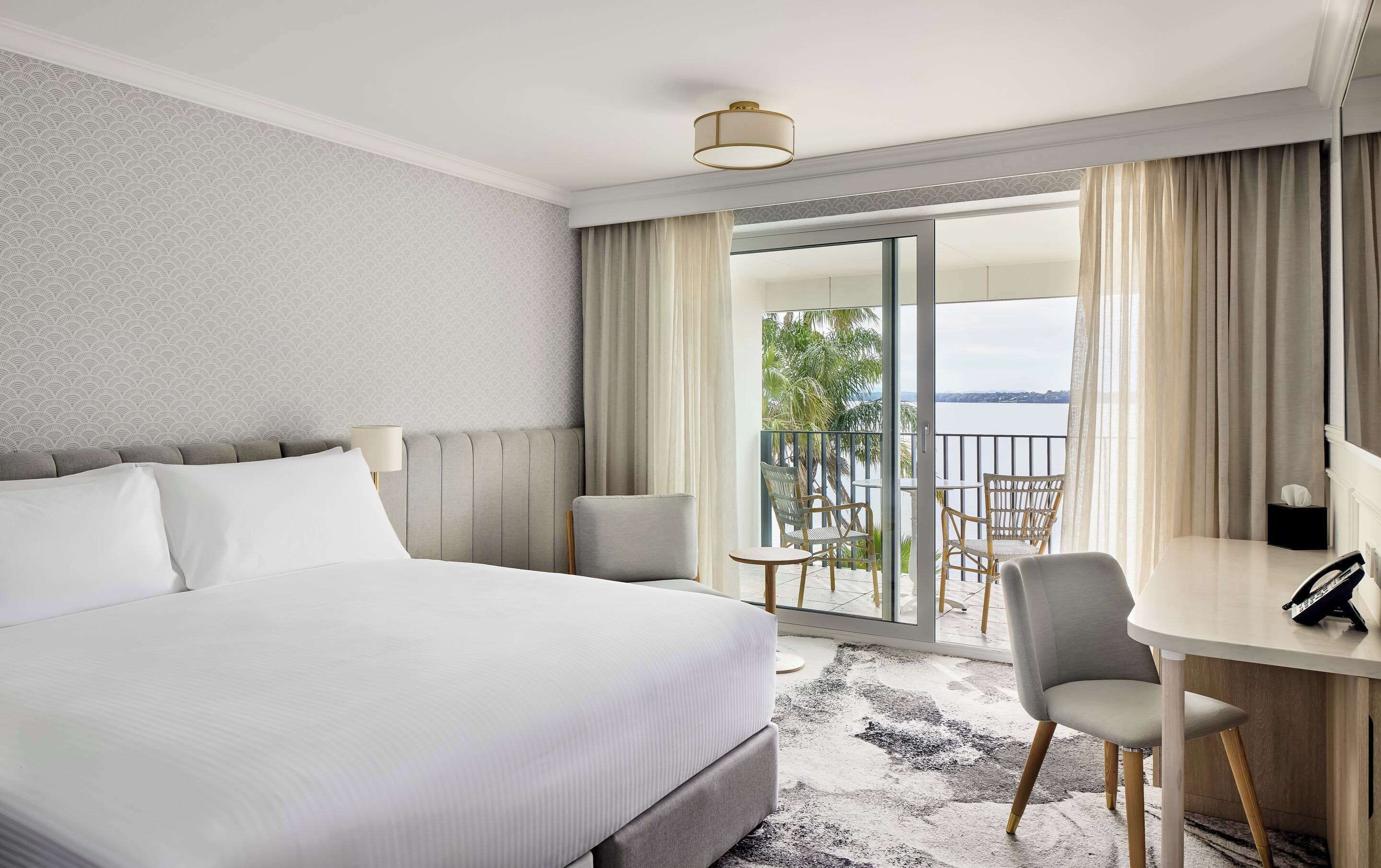 room, 1 king bed (water view) | in-room safe, individually furnished, desk, laptop workspace