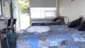 1 quarto, roupas de cama premium, ferros/tábuas de passar roupa