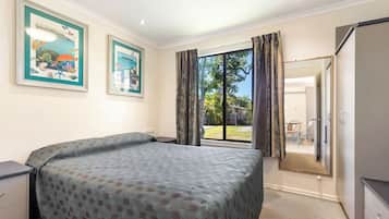 Two Bedroom Holiday Home | Iron/ironing board, travel cot, free WiFi, bed sheets