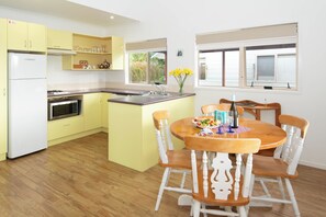Superior Cottage, 1 Bedroom, Balcony, Garden View | Private kitchen | Full-size fridge, microwave, stovetop, coffee/tea maker