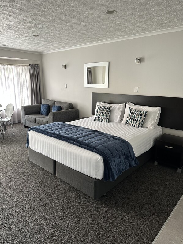 1 Bedroom Unit (Sleeps 4) | Premium bedding, desk, blackout curtains, iron/ironing board