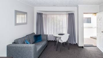 Premium bedding, desk, blackout curtains, iron/ironing board