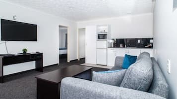 50-inch flat-screen TV with satellite channels, TV, DVD player