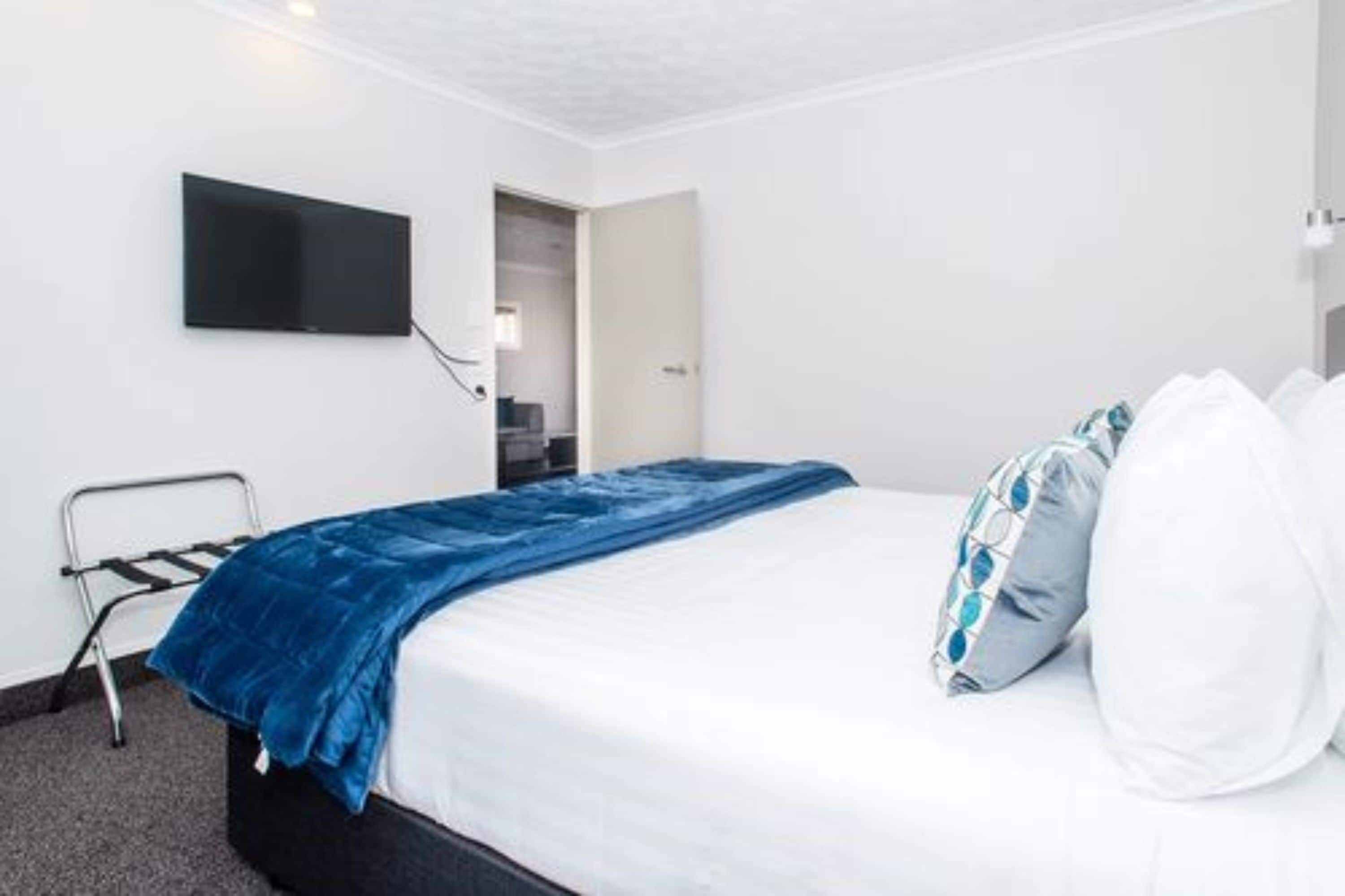 Premium bedding, desk, blackout curtains, iron/ironing board