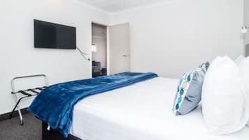 Premium bedding, desk, blackout curtains, iron/ironing board