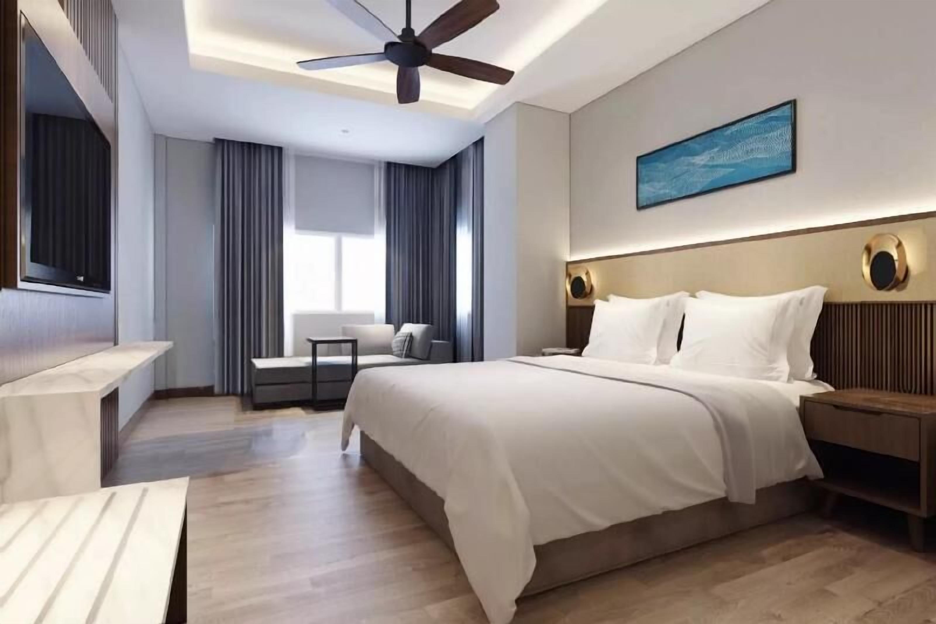 Coffre-fort, bureau, fer et planche à repasser, accès au Wi-Fi (inclus)