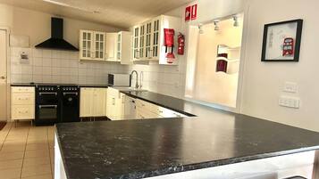 3 Bedroom Premium Cottage | Private kitchen | Full-sized fridge, microwave, oven, stovetop