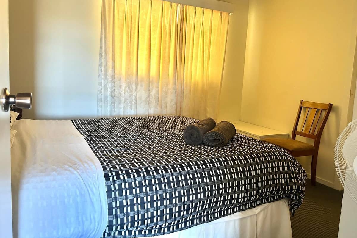 Premium bedding, pillow-top beds, blackout curtains, iron/ironing board