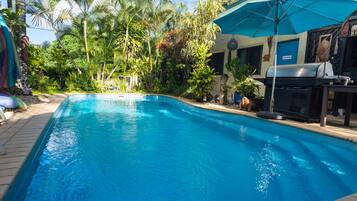 Outdoor pool, pool umbrellas, sun loungers