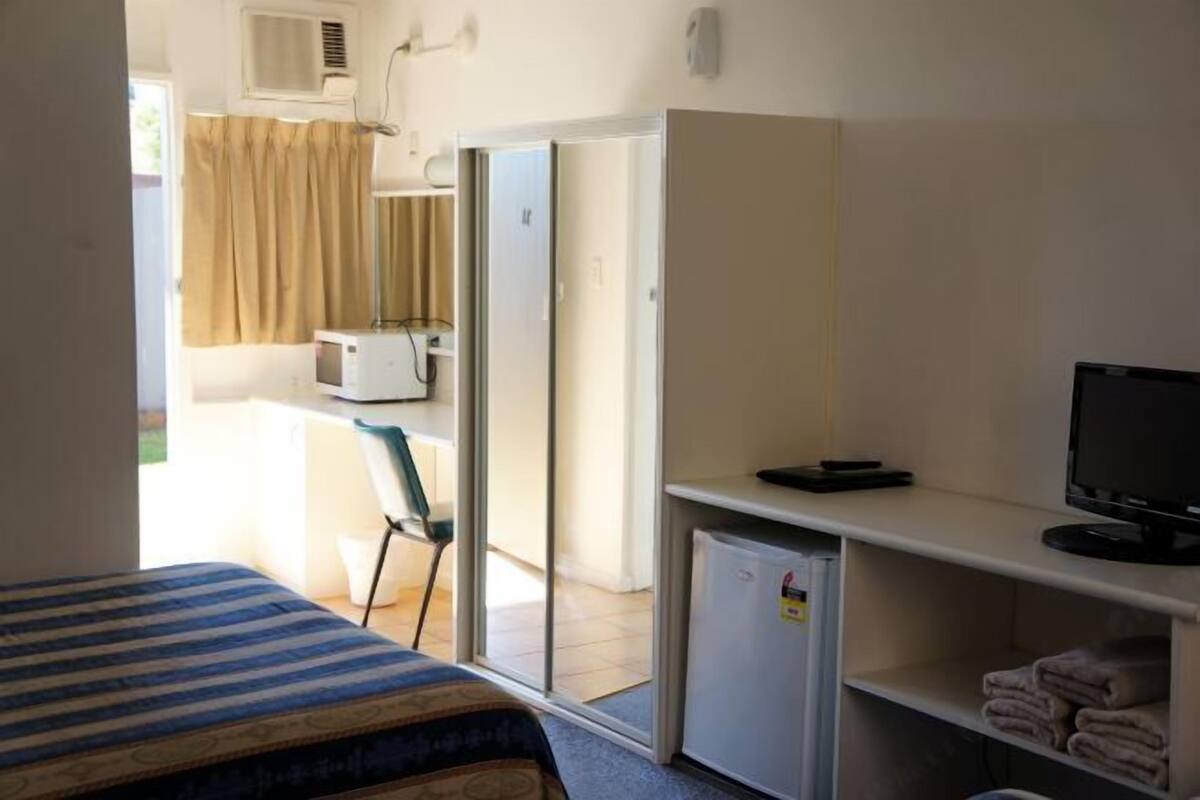 Desk, blackout curtains, iron/ironing board (on request), free WiFi