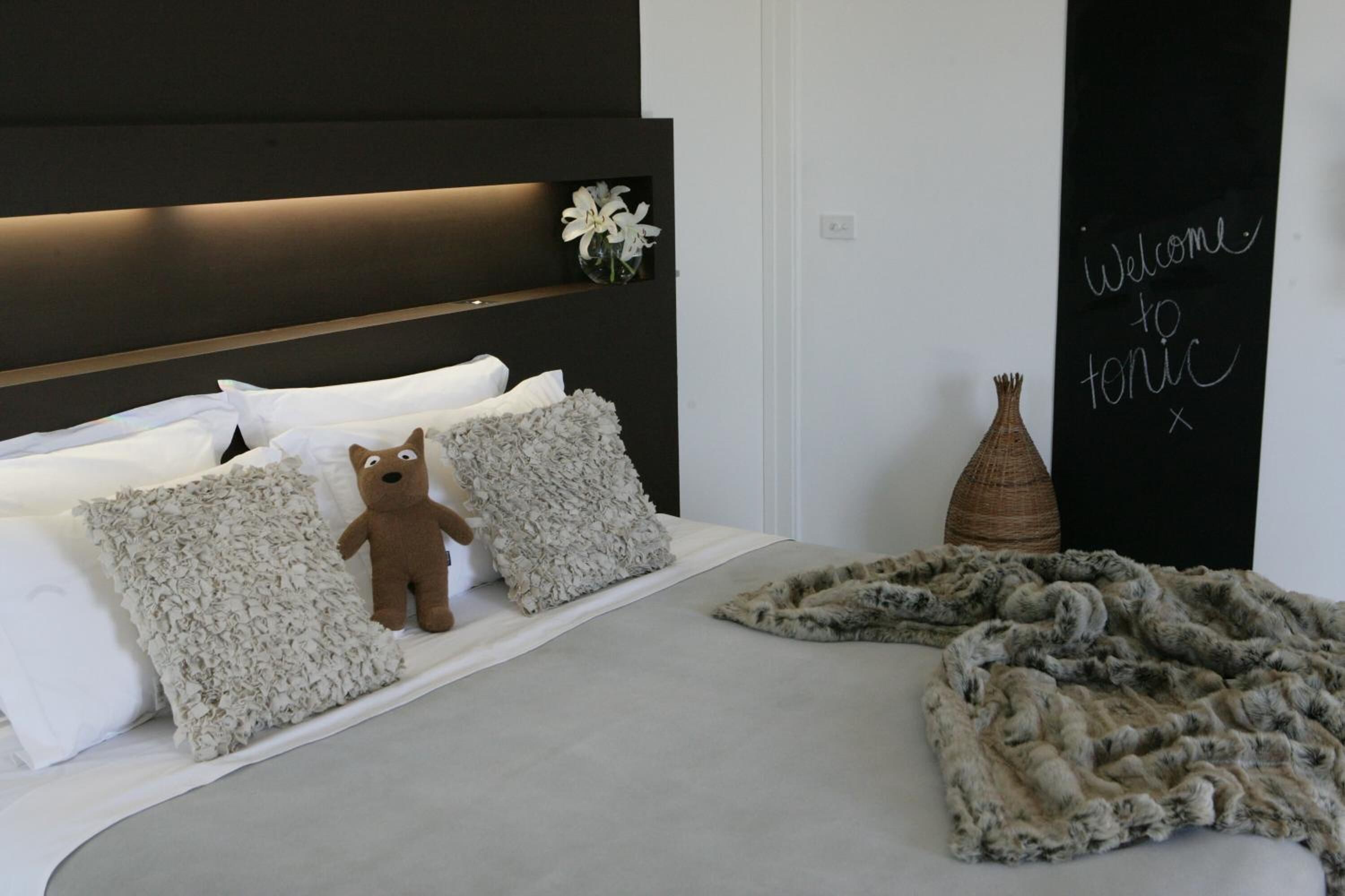Premium bedding, down comforters, pillowtop beds, minibar