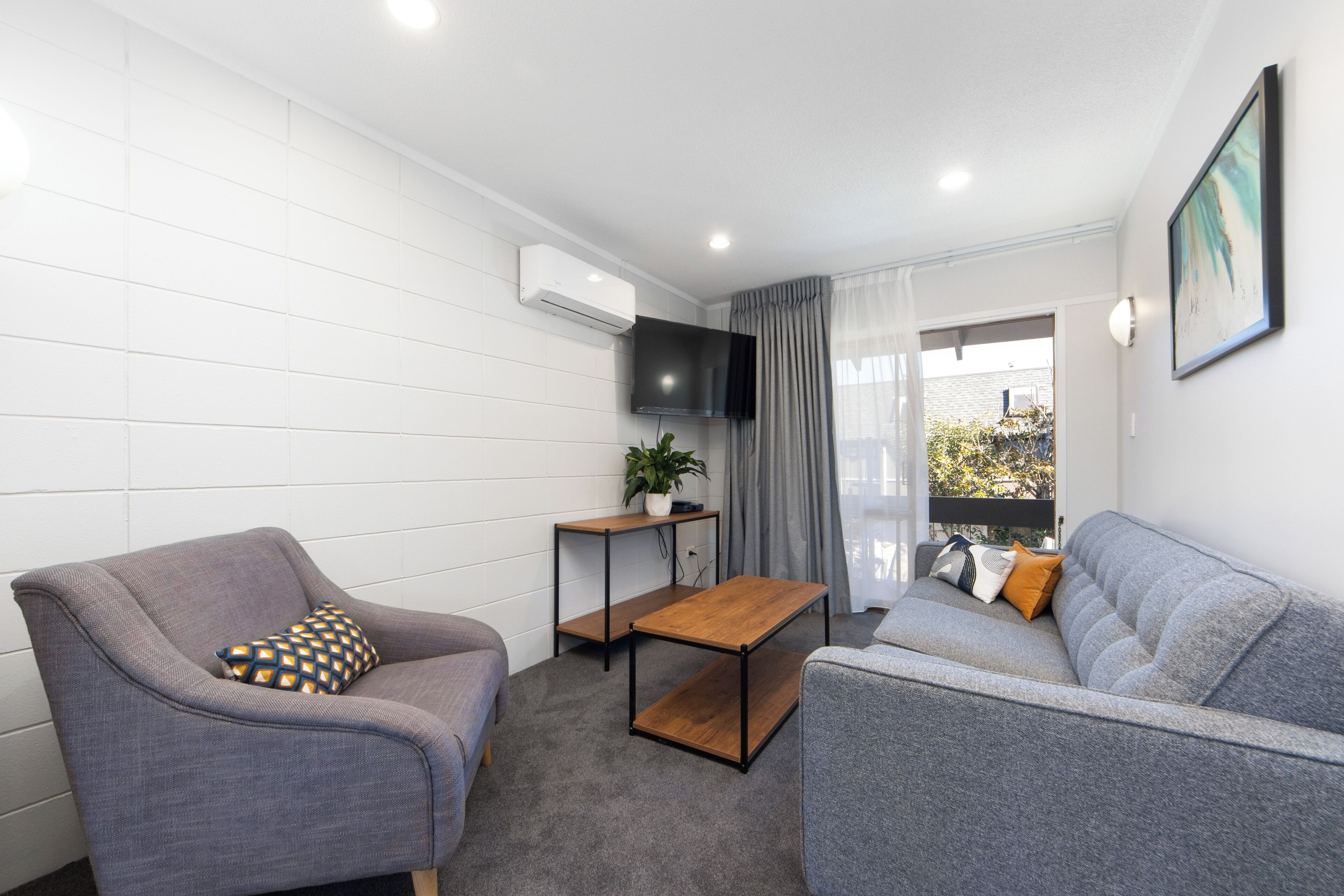 Suite, 1 Bedroom | Living area | Flat-screen TV