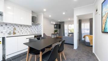 Suite, 1 Bedroom | Private kitchen | Fridge, microwave, coffee/tea maker, electric kettle