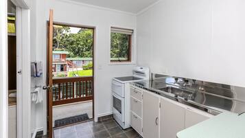 Two Bedroom | Private kitchen | Fridge, microwave, oven, electric kettle