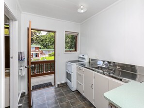 Two Bedroom | Private kitchen | Fridge, microwave, oven, electric kettle - Flamingo Motel (New Plymouth)